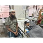 Abid, who passed out of secondary school, is crying in the hospital bed after being shot.